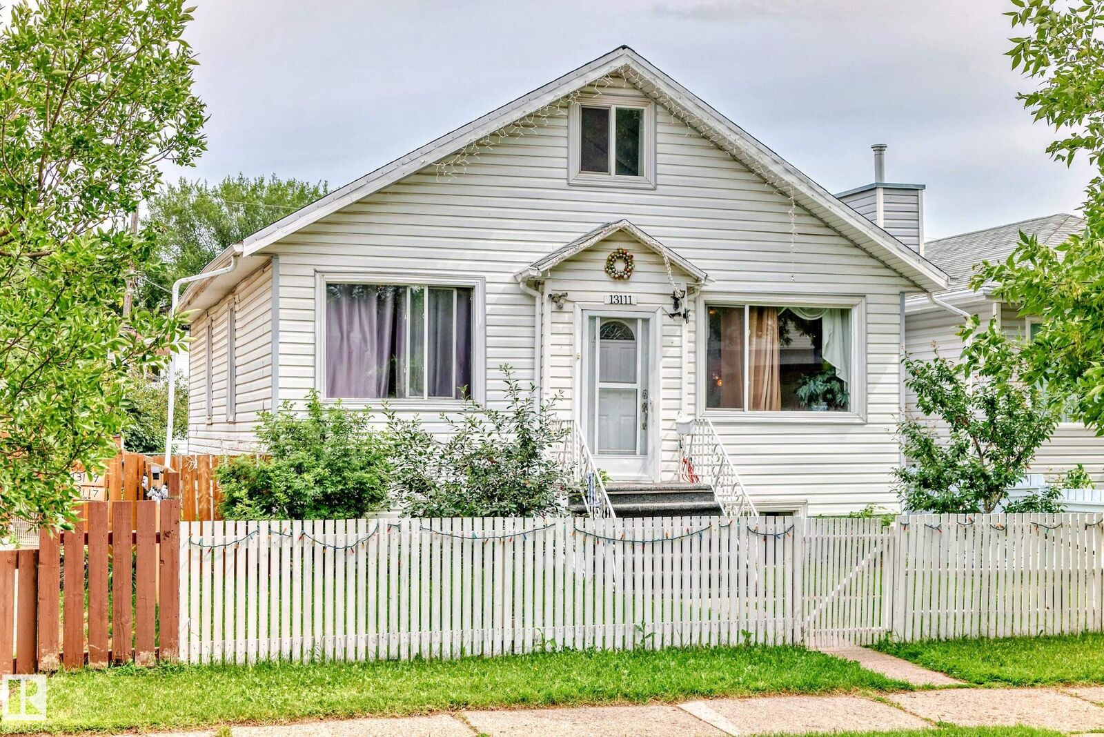 Property Photo: 13111 65 Street NW AB T5A 1A2