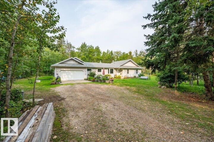 Property Photo: 57303 Rge Road 233 213 AB T0A 1N0