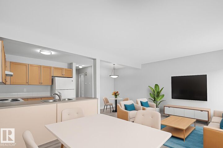 Property Photo: 230 Edwards Drive SW 15 AB T6X 1G7
