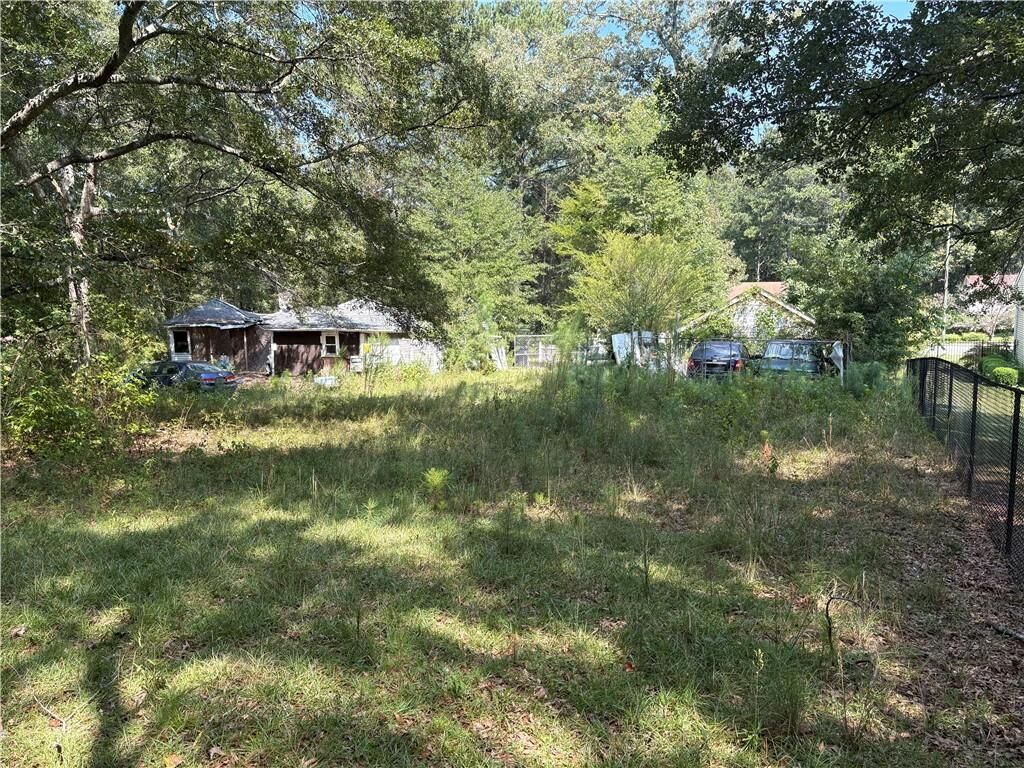 Property Photo:  6355 Kimberly Mill Road  GA 30349 