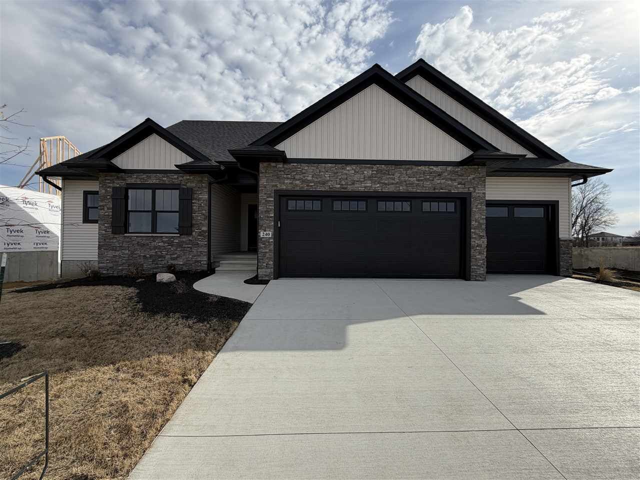 Property Photo:  240 S Seven Oaks Road  IA 52317 