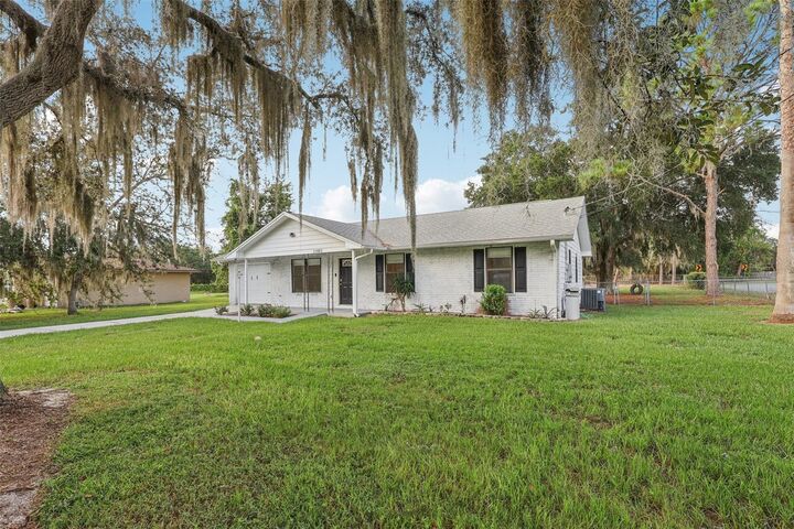 Property Photo:  11802 Ocklawaha Drive  FL 34788 
