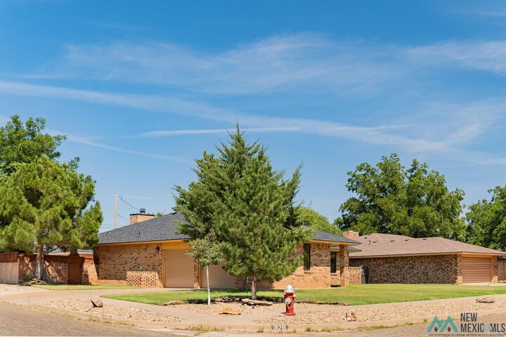 Property Photo: 320 Kathie Drive NM 88101