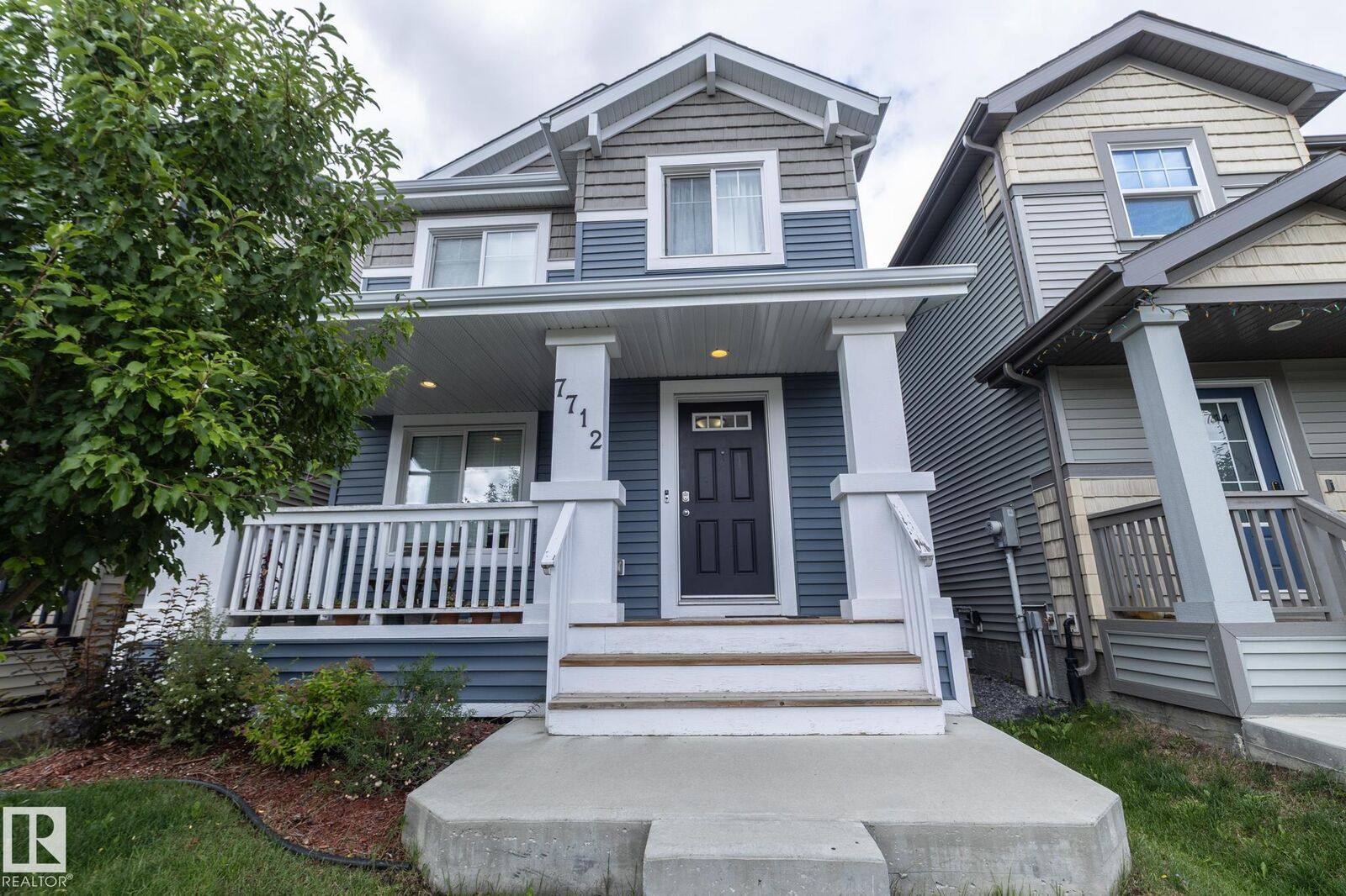 Property Photo: 7712 Eifert Crescent NW AB T6M 0W2