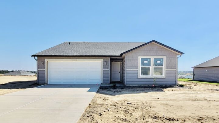 Property Photo:  819 E K St  WA 99006 