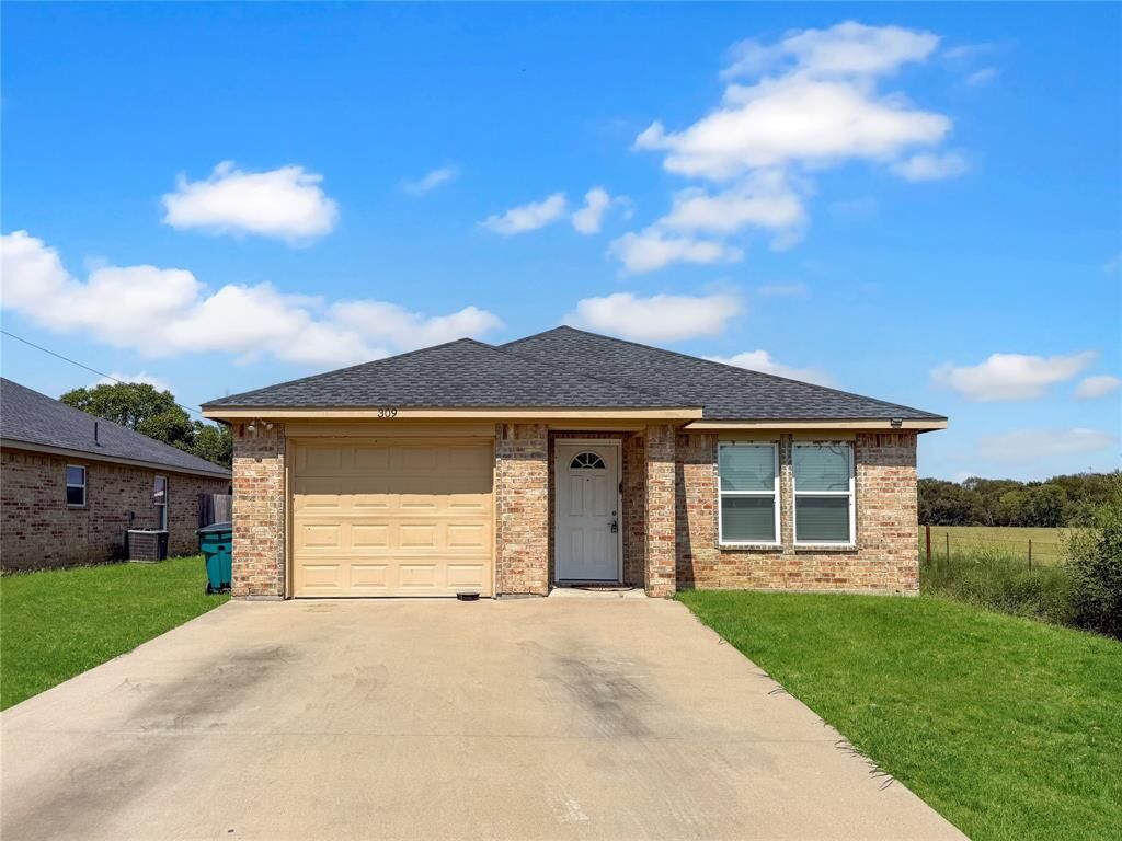 Photo de la propriété:  309 E 2nd Street  TX 76064 