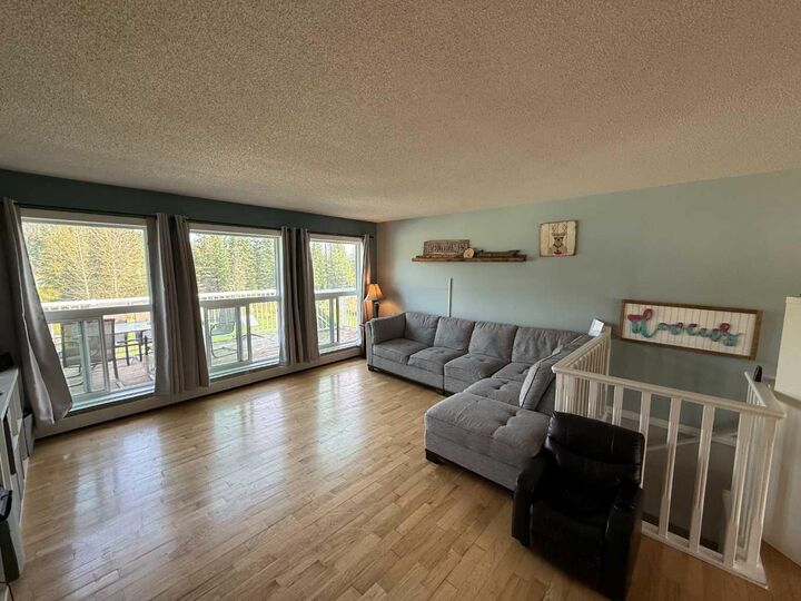 Property Photo:  106 West River Road  AB T7V 1Z1 