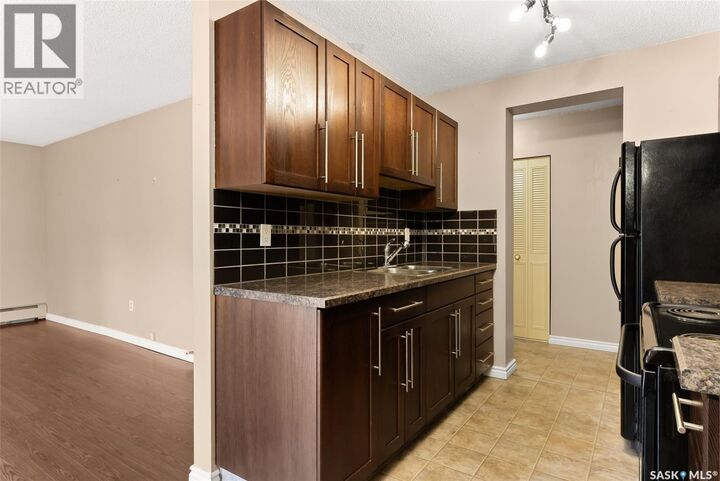 Property Photo:  6 1953 Garnet Street  SK S4T 2Z5 