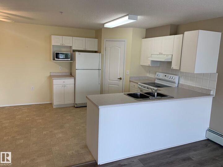 Property Photo:  13441 127 Street NW 362  AB T5L 5B6 