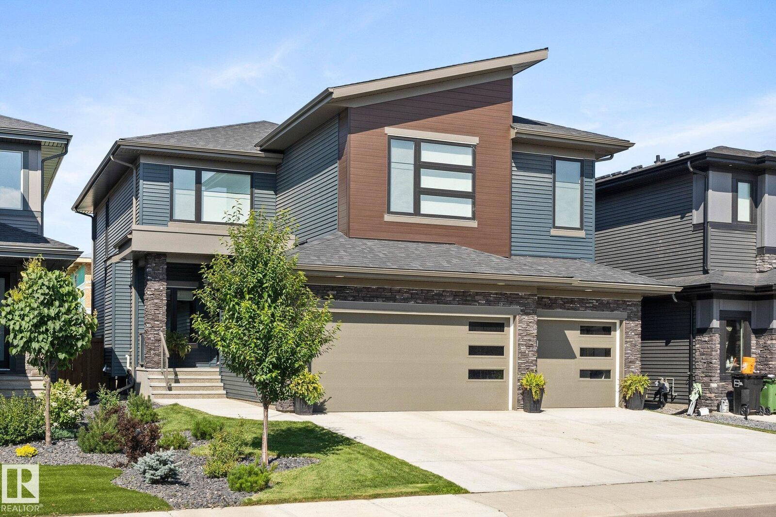 Property Photo: 6828 Knox Loop SW AB T6W 4R3