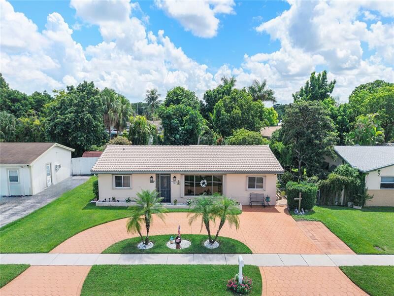 Property Photo:  6444 NW 19th Ct  FL 33063 