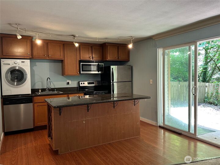 Property Photo:  23453  16th Avenue S A102  WA 98198 