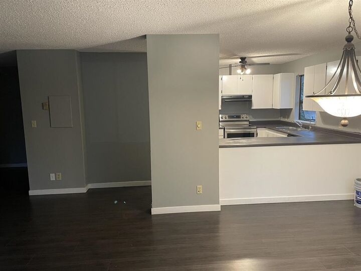 Property Photo: 7131 133A Street 201 BC V3W 8A1