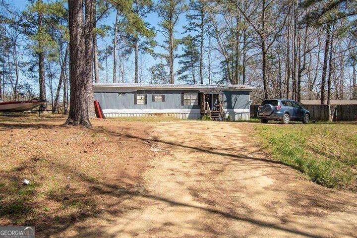 Property Photo:  1569 Corinth Poseyville Road  GA 30110 