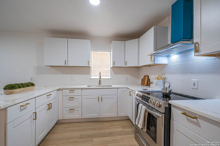 Property Photo:  303 Victor  TX 78209 