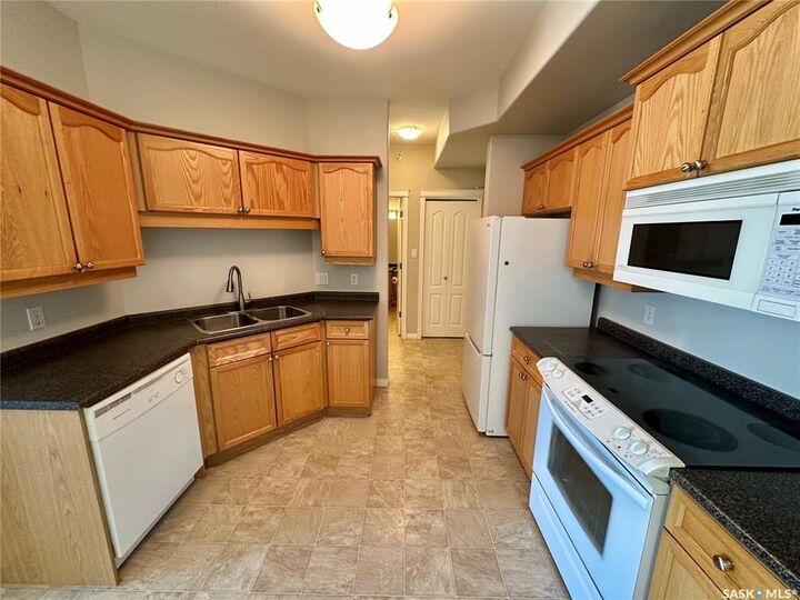 Property Photo: 110 Armistice Way 403 SK S7J 5L8