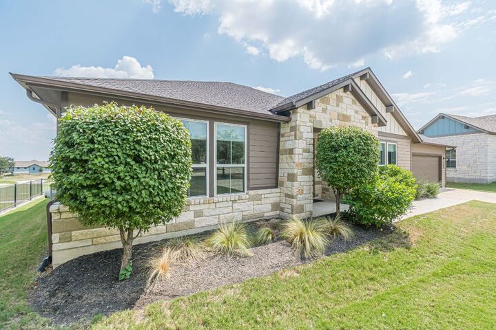 Property Photo:  318 Dancing Oak Lane 104  TX 78666 