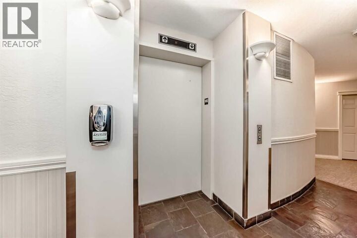 Property Photo: 2 Hemlock Crescent Southwest AB T3C 2Z1