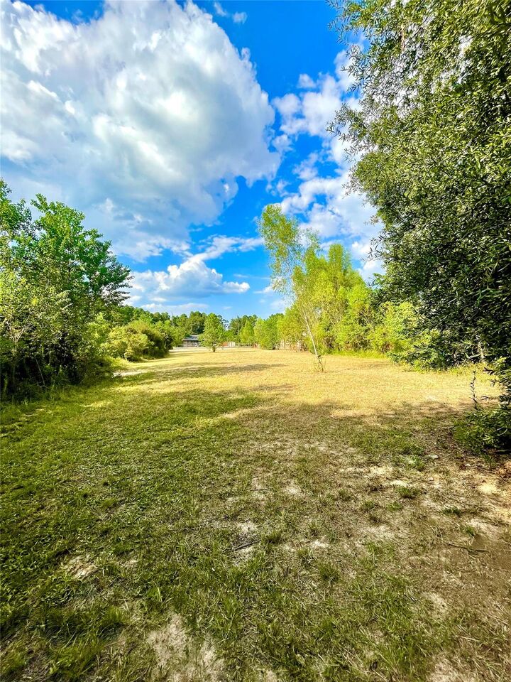 Property Photo:  3277 County Road 3479B  TX 77327 
