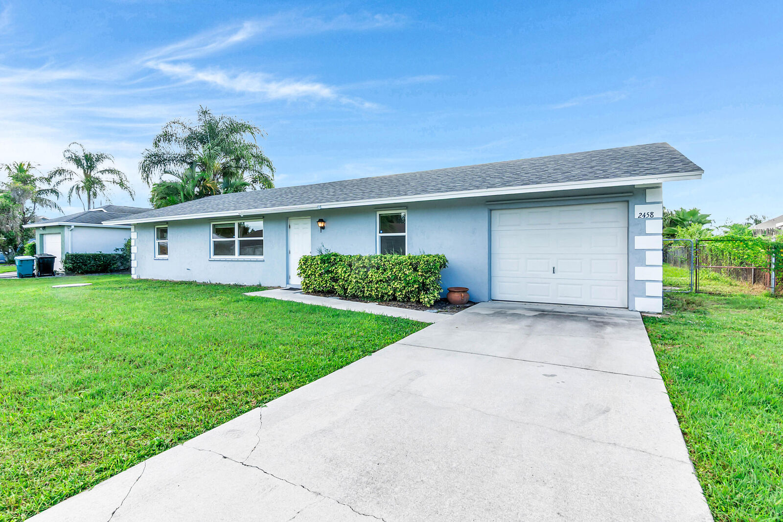 Property Photo: 2458 SW Hinchman Street FL 34984