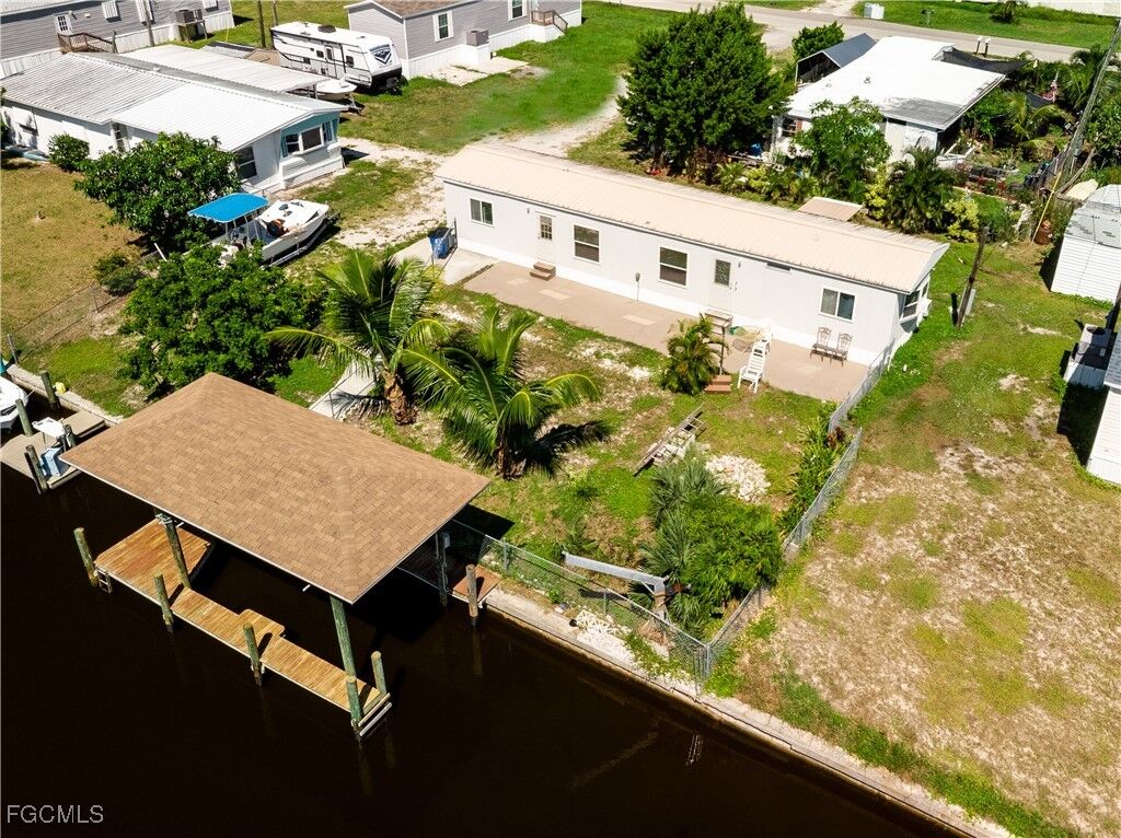 Property Photo: 4873 Curlew Drive FL 33956