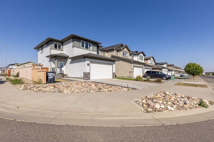 Property Photo:  875 Miners Boulevard W  AB T1J 5L9 