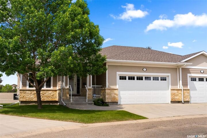Property Photo:  122 Wintergreene Lane  SK S4S 0A7 