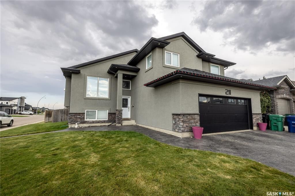 Property Photo: 211 Sauer Crescent SK S7S 1L9