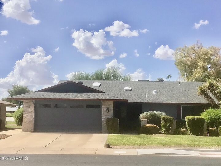 Property Photo: 18818 N 130th Avenue AZ 85375