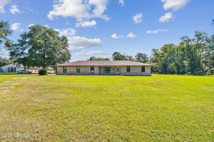 Property Photo:  24033 County Road 121  FL 32046 