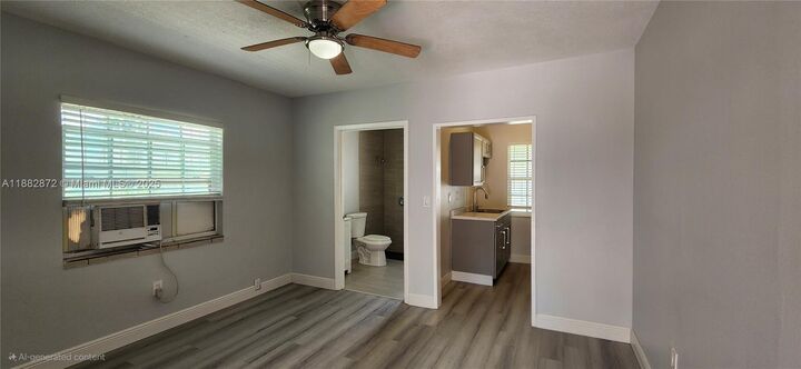 Property Photo:  405 NW 64th St 1  FL 33150 