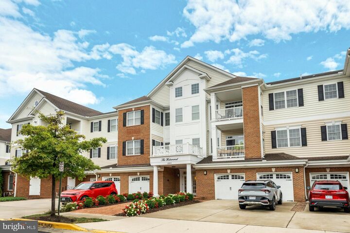 Property Photo:  15211 Royal Crest Drive 405  VA 20169 