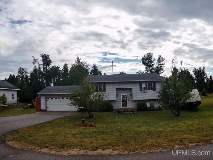 Property Photo:  610 Lakewood Lane  MI 49855 