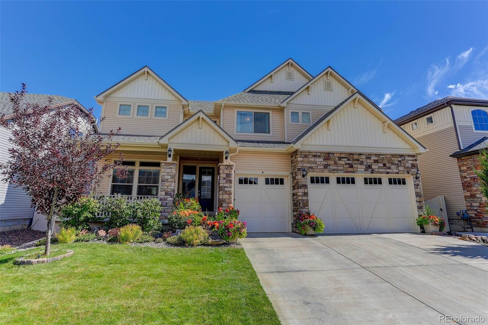 Property Photo:  5012 Liverpool Street  CO 80249 