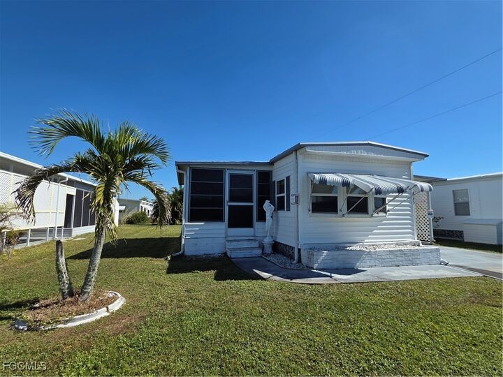 Property Photo:  865 Moonlight Drive  FL 33917 