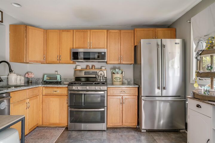 Property Photo:  78 Merrimack Drive  NH 03054 