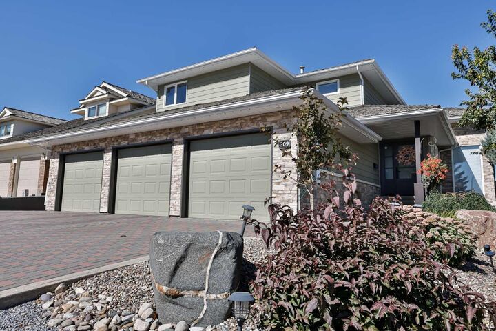 Property Photo:  209 Coachwood Point W  AB T1K 6A7 