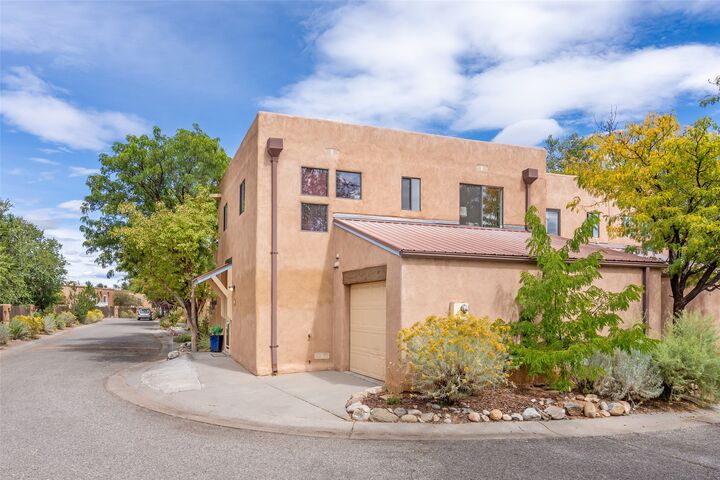 Property Photo:  132 Romero 12  NM 87501 