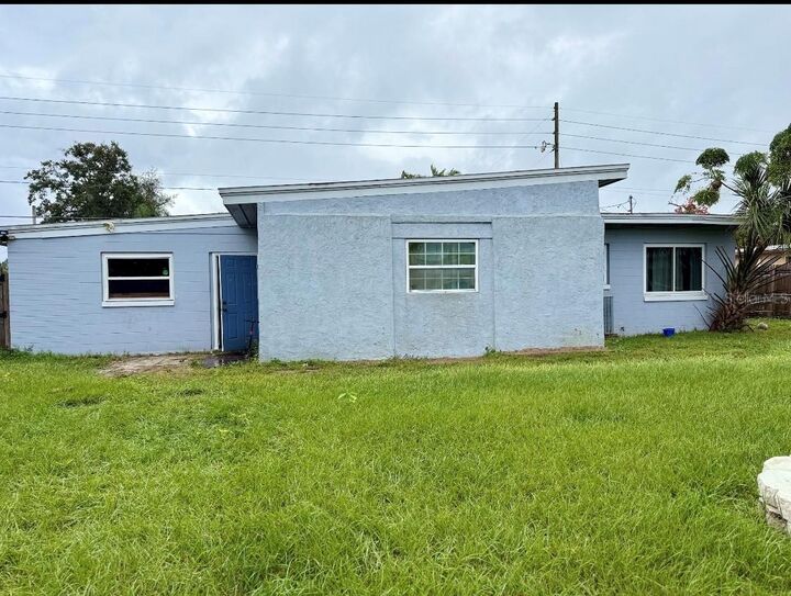 Property Photo: 6021 Yucatan Drive FL 32807
