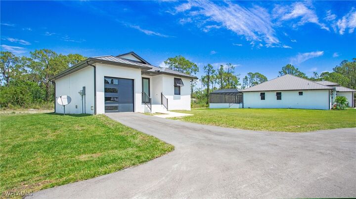 Property Photo: 2343 Oil Well (Unit 2) Road FL 34120