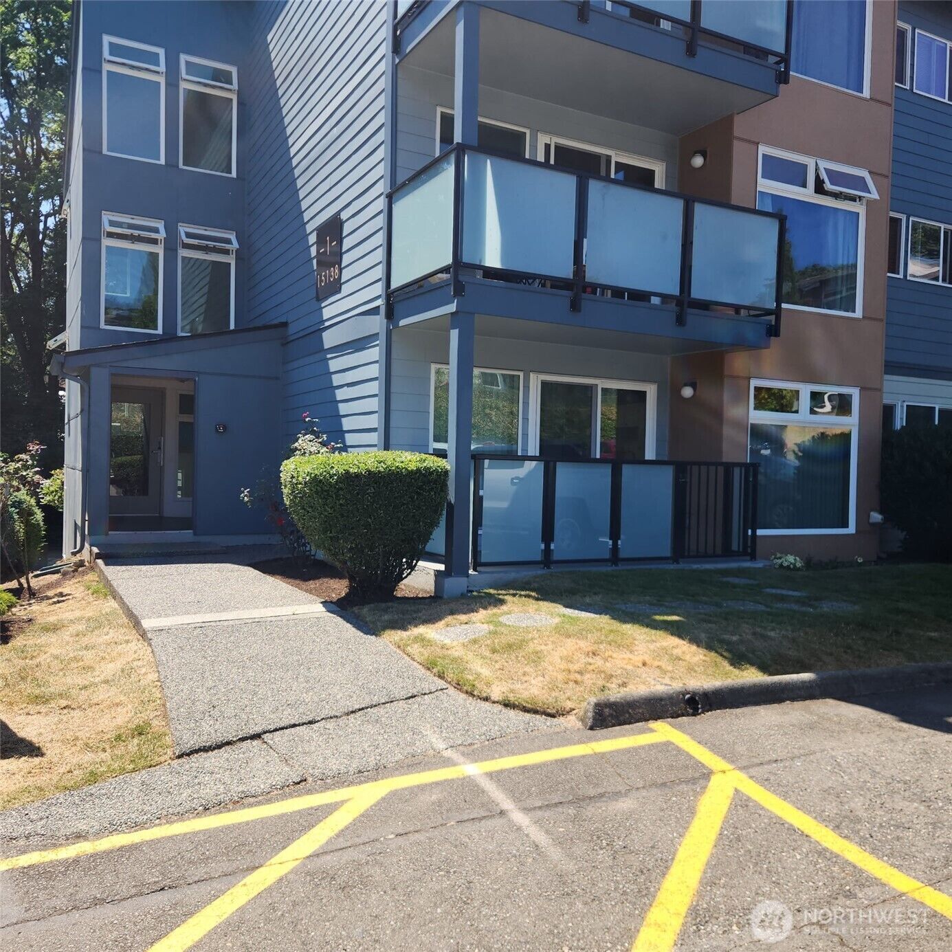 Property Photo:  15138  65th Avenue S 107  WA 98188 