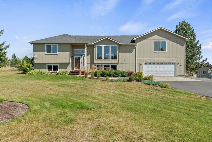 Property Photo:  17206 W Buckboard Ave  WA 99022 