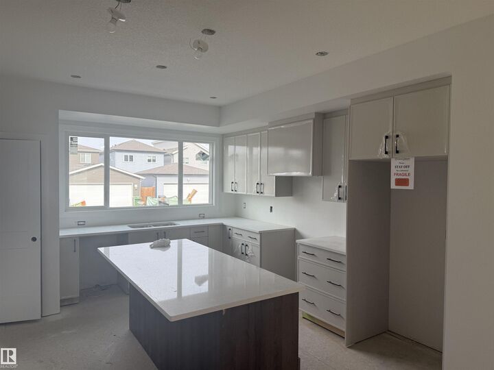 Property Photo: 206 Starling AB T8L 0X9