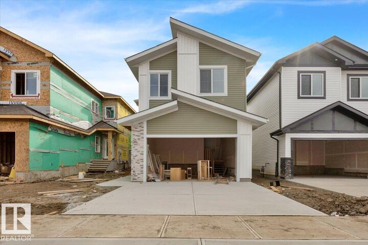 Property Photo:  57 Blackbird Bend  AB T8L 0G6 