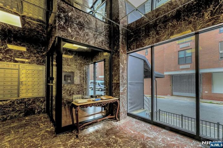 Property Photo:  9019 Wall 6B  NJ 07047 