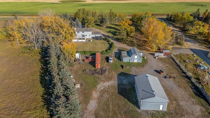 Property Photo: 233081 Glenmore View Road AB T1X 0H3
