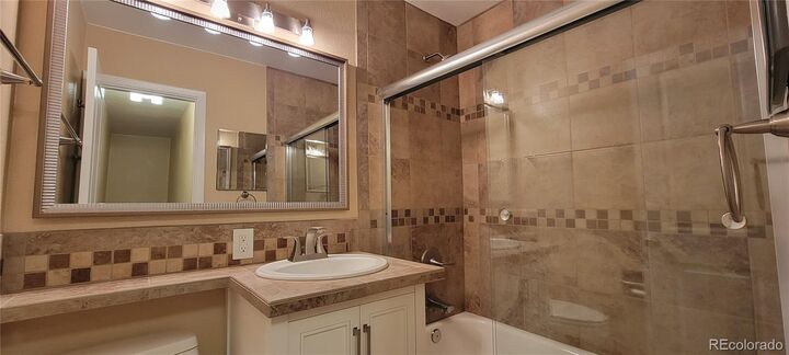 Property Photo:  8055 Wolff Street E  CO 80031 