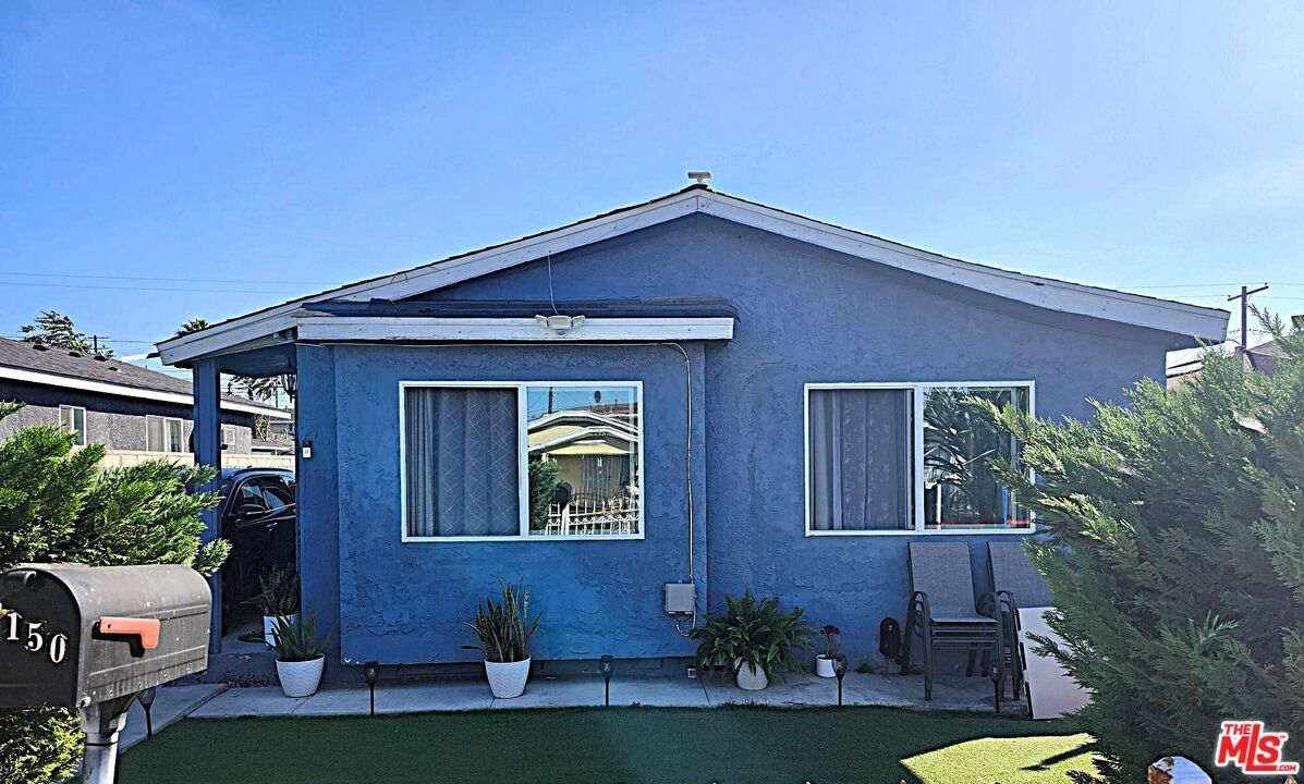 Property Photo:  1150 E 80th St  CA 90001 