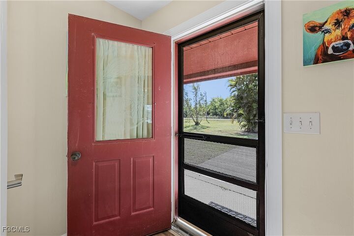 Property Photo:  4754 Woodstock Road  FL 33956 
