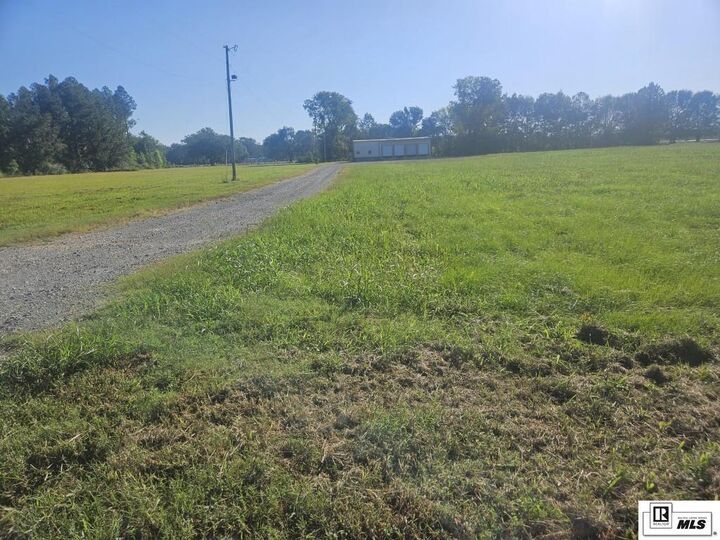 Property Photo:  5651 A Highway 165  LA 71203